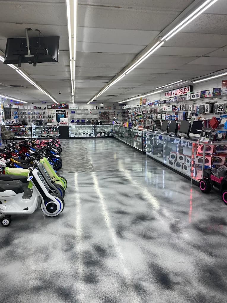Inside the Family Wireless shop in Dallas, with accessory displays and glass counters